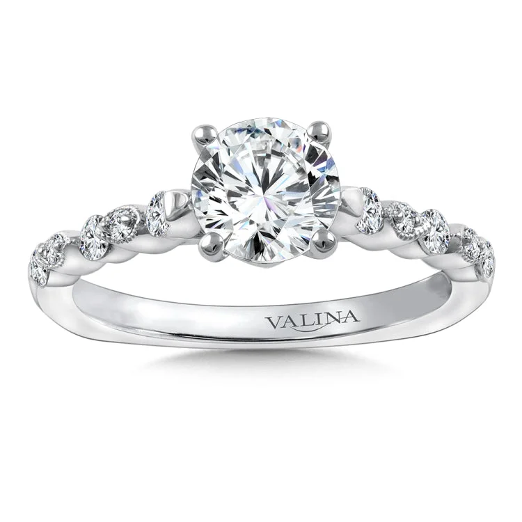 Diamond stackable engagement ring mounting with milgrain detailing and side stones set in 14k white gold.