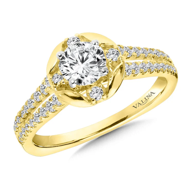 Diamond halo engagement ring mounting with side stones set in 14k yellow gold.