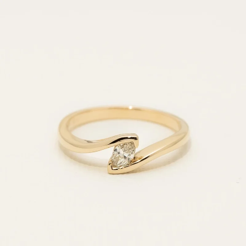 Marquise Shaped Diamond Ring in 14kt Yellow Gold (1/5ct)